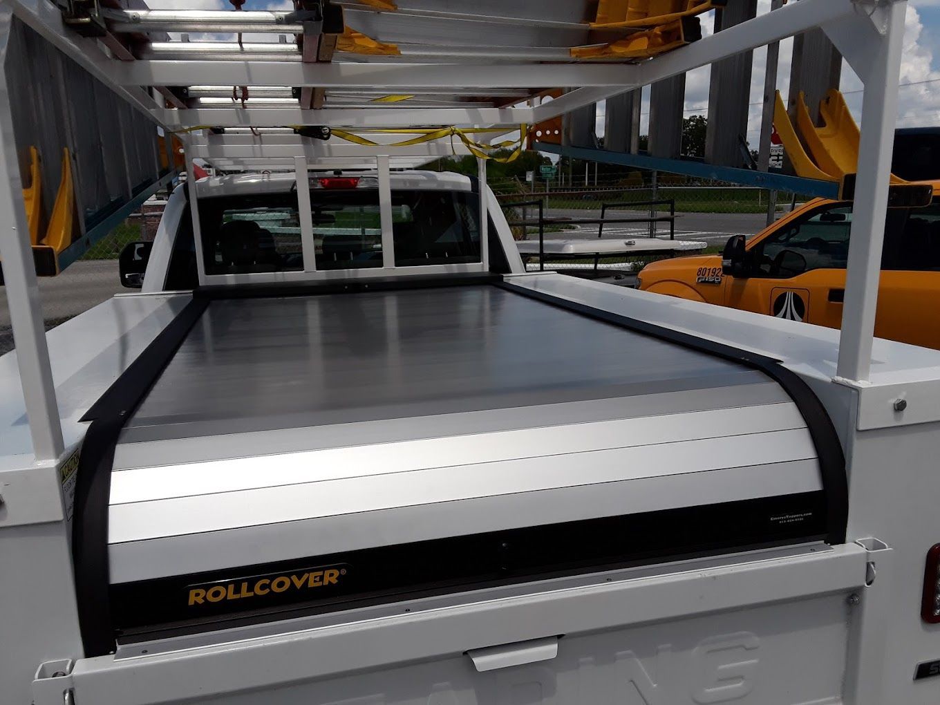 Rollcover sliding panel truck bed cover